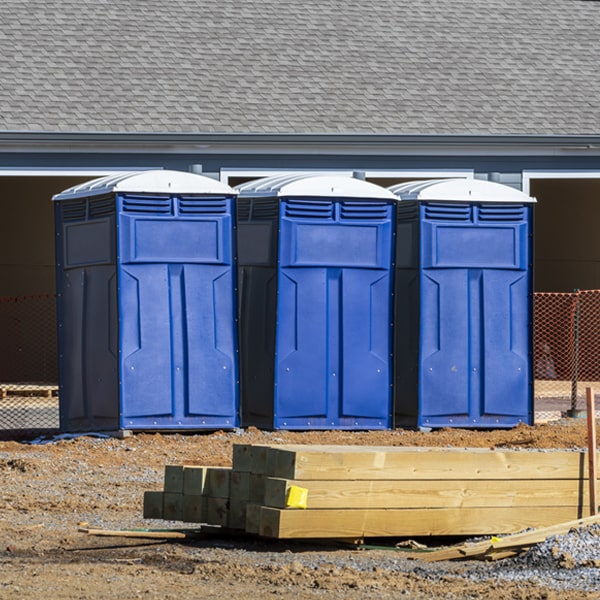 what is the cost difference between standard and deluxe portable toilet rentals in Harrell AR